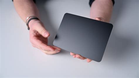 The Evolution of Trackpads: From Silver to Black - Unveiling the Apple Magic Trackpad